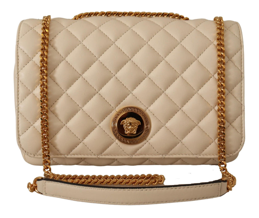 Elegant White Nappa Leather Shoulder BagIndulge in the unmatched elegance of this stunning shoulder bag, presented by the prestigious house of Versace. This brand new accessory, complete with tags and its own dustbag, is a symbol of luxury and sophisticat