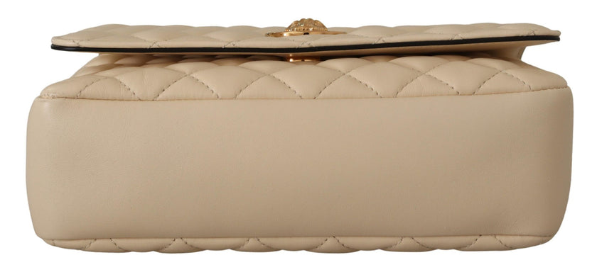 Elegant White Nappa Leather Shoulder BagIndulge in the unmatched elegance of this stunning shoulder bag, presented by the prestigious house of Versace. This brand new accessory, complete with tags and its own dustbag, is a symbol of luxury and sophisticat