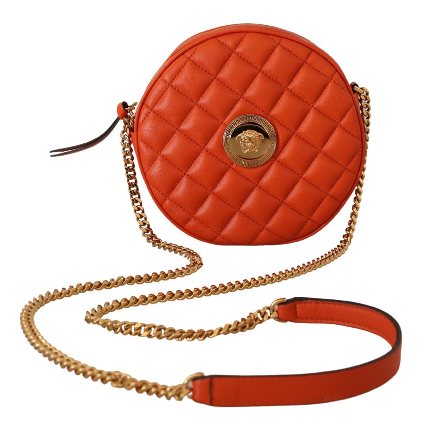 Elegant Round Nappa Leather Crossbody BagDiscover the epitome of luxury with our stunning Versace Round Crossbody Shoulder Bag, your perfect companion for a sophisticated statement. Brimming with allure, this bag features a sleek zip closure and is embell