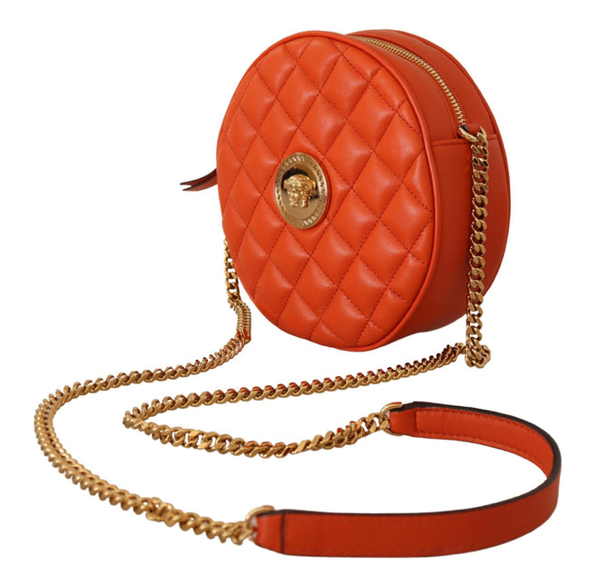 Elegant Round Nappa Leather Crossbody BagDiscover the epitome of luxury with our stunning Versace Round Crossbody Shoulder Bag, your perfect companion for a sophisticated statement. Brimming with allure, this bag features a sleek zip closure and is embell