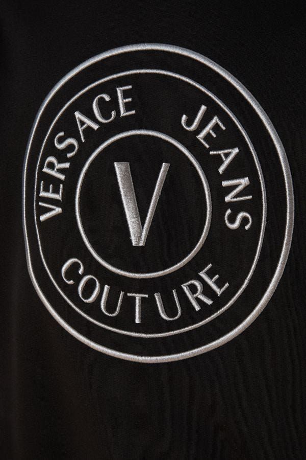 Stunning Hooded Black Cotton SweatshirtExude effortless style with this absolutely stunning hooded sweatshirt from Versace Jeans. Crafted from premium 100% cotton, it features a comfortable feel and a chic black hue that guarantees a versatile addition to