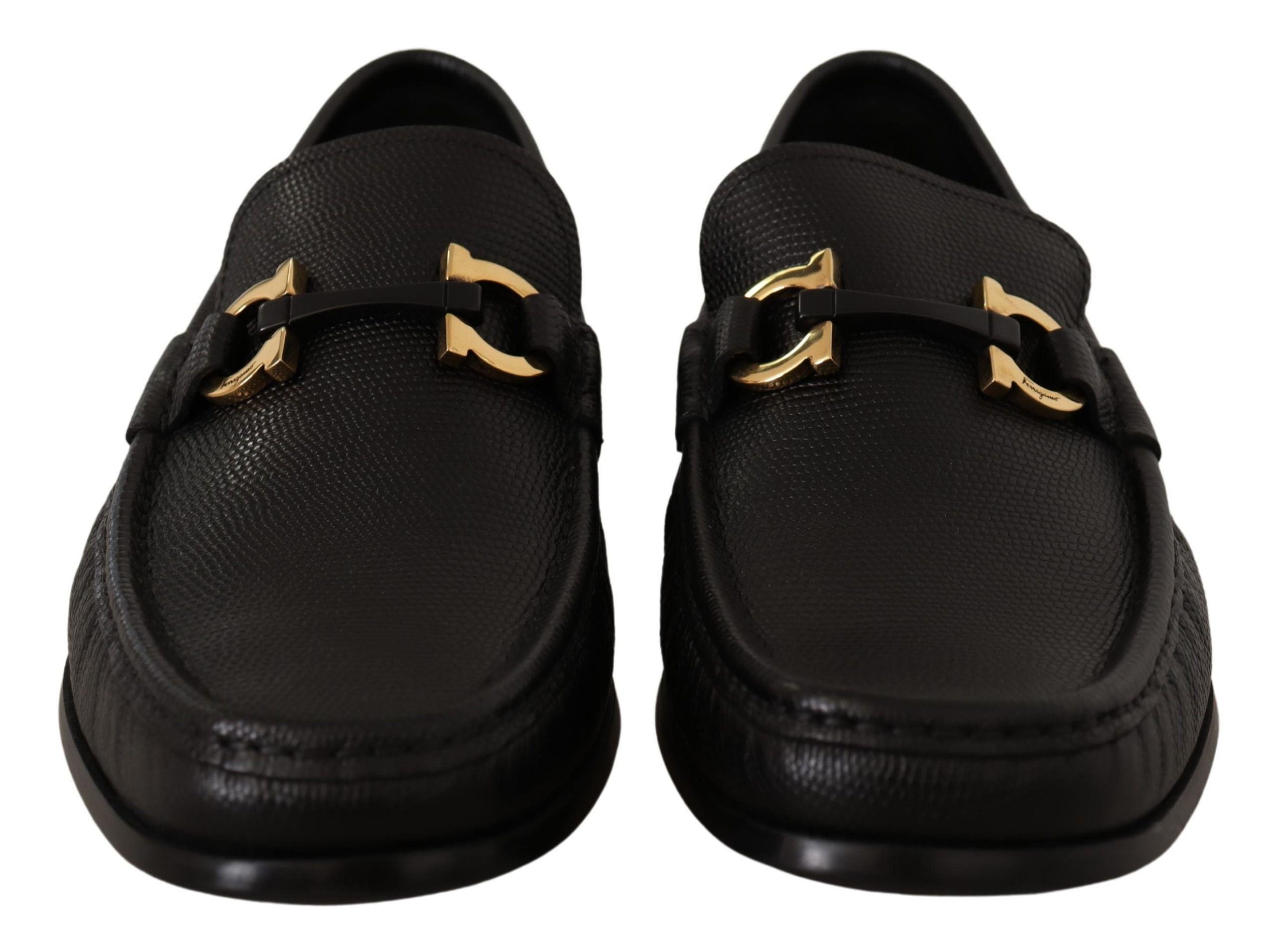 Elegant Black Calf Leather LoafersStep into luxury with these impeccable Salvatore Ferragamo loafers, crafted for the discerning gentleman. This brand new pair arrives in its original box with tags and a protective dust bag, ensuring authenticity and exce