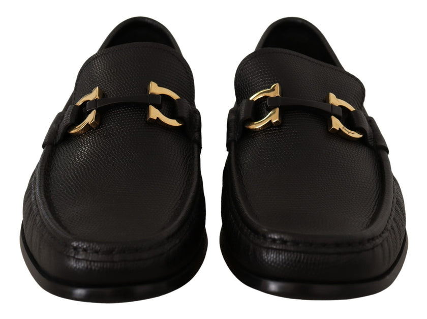 Elegant Black Calf Leather LoafersStep into luxury with these impeccable Salvatore Ferragamo loafers, crafted for the discerning gentleman. This brand new pair arrives in its original box with tags and a protective dust bag, ensuring authenticity and exce