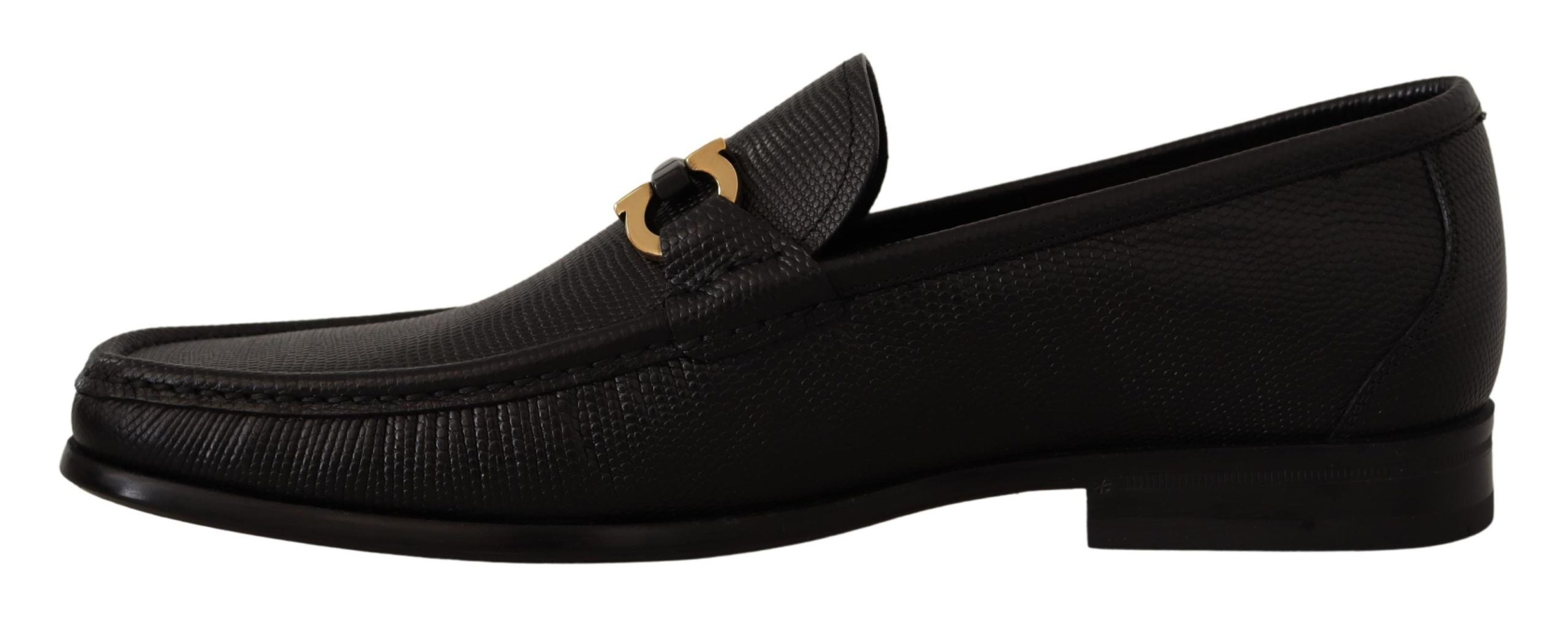 Elegant Black Calf Leather LoafersStep into luxury with these impeccable Salvatore Ferragamo loafers, crafted for the discerning gentleman. This brand new pair arrives in its original box with tags and a protective dust bag, ensuring authenticity and exce