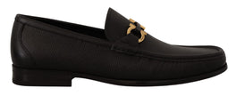 Elegant Black Calf Leather LoafersStep into luxury with these impeccable Salvatore Ferragamo loafers, crafted for the discerning gentleman. This brand new pair arrives in its original box with tags and a protective dust bag, ensuring authenticity and exce