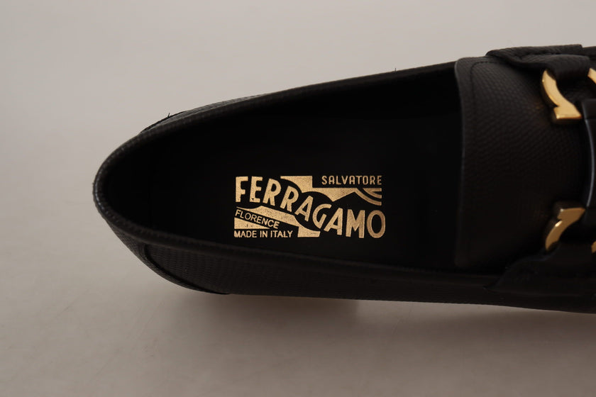 Elegant Black Calf Leather LoafersStep into luxury with these impeccable Salvatore Ferragamo loafers, crafted for the discerning gentleman. This brand new pair arrives in its original box with tags and a protective dust bag, ensuring authenticity and exce