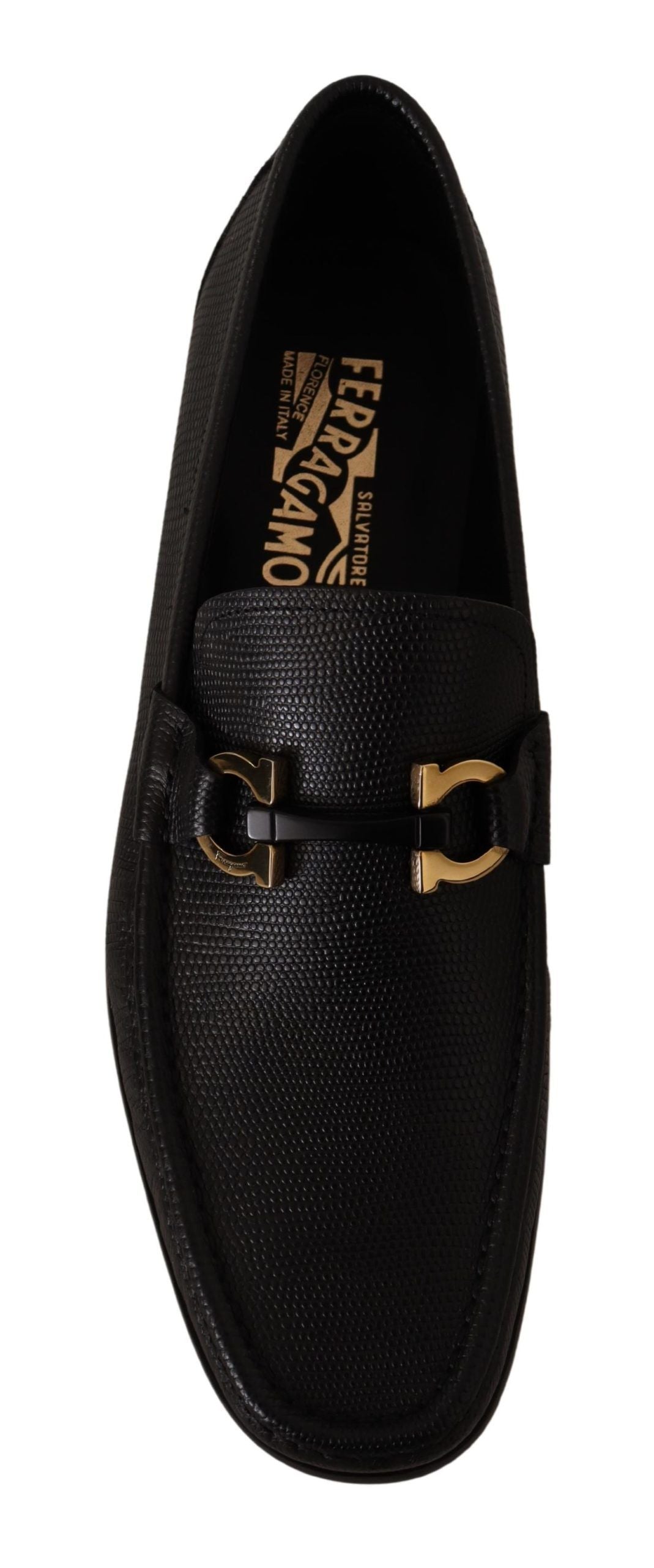 Elegant Black Calf Leather LoafersStep into luxury with these impeccable Salvatore Ferragamo loafers, crafted for the discerning gentleman. This brand new pair arrives in its original box with tags and a protective dust bag, ensuring authenticity and exce