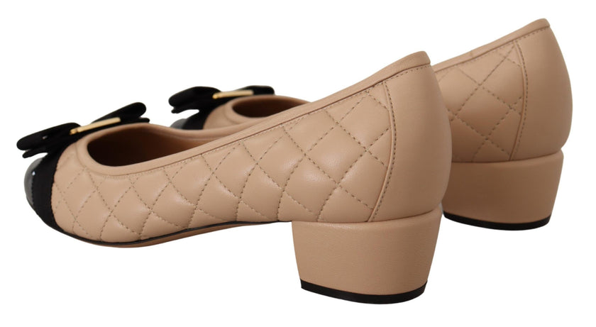 Elegant Quilted Leather Pumps in Beige and BlackEmbrace timeless elegance and modern sophistication with our Salvatore Ferragamo footwear. The stunning pumps combine luxurious quilted nappa leather with glossy patent accents, crowned with the iconic grosg