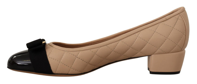 Elegant Quilted Leather Pumps in Beige and BlackEmbrace timeless elegance and modern sophistication with our Salvatore Ferragamo footwear. The stunning pumps combine luxurious quilted nappa leather with glossy patent accents, crowned with the iconic grosg