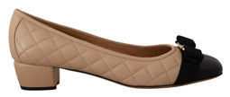 Elegant Quilted Leather Pumps in Beige and BlackEmbrace timeless elegance and modern sophistication with our Salvatore Ferragamo footwear. The stunning pumps combine luxurious quilted nappa leather with glossy patent accents, crowned with the iconic grosg