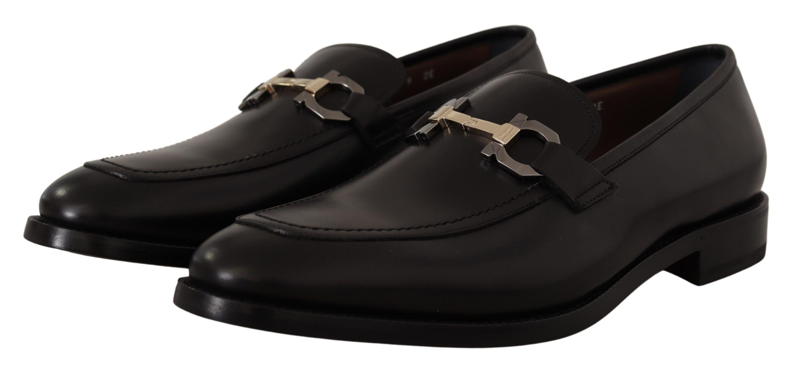 Suave Black Leather Gancio Bit LoafersStep into sophistication with our exquisite Salvatore Ferragamo loafers, the epitome of luxury for the discerning gentleman. Crafted with the highest attention to detail, these formal shoes are more than just footwear