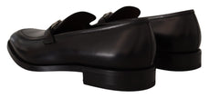 Suave Black Leather Gancio Bit LoafersStep into sophistication with our exquisite Salvatore Ferragamo loafers, the epitome of luxury for the discerning gentleman. Crafted with the highest attention to detail, these formal shoes are more than just footwear
