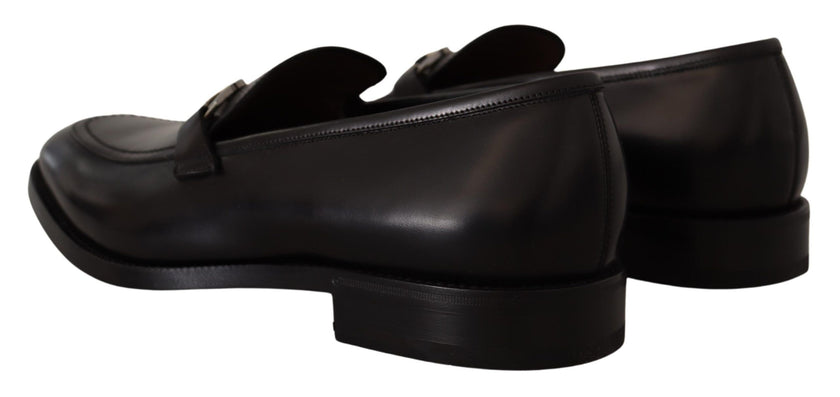 Suave Black Leather Gancio Bit LoafersStep into sophistication with our exquisite Salvatore Ferragamo loafers, the epitome of luxury for the discerning gentleman. Crafted with the highest attention to detail, these formal shoes are more than just footwear