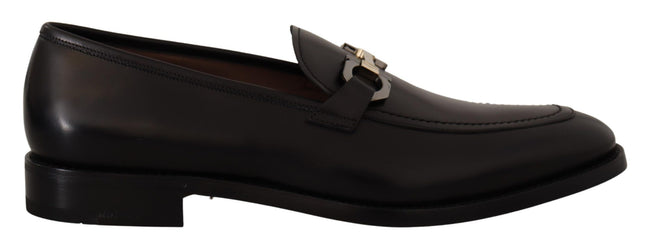 Suave Black Leather Gancio Bit LoafersStep into sophistication with our exquisite Salvatore Ferragamo loafers, the epitome of luxury for the discerning gentleman. Crafted with the highest attention to detail, these formal shoes are more than just footwear