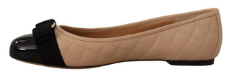 Elegant Quilted Leather Flats - Chic Dual-Tone DesignDiscover the epitome of understated elegance with these Salvatore Ferragamo women’s flats. As gorgeous as they are versatile, these shoes come brand new with original box, tags, and a protective dust ba