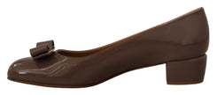 Elegant Caraway Brown Pumps with Vara BowDiscover the epitome of sophistication with these beautiful Caraway Brown pumps from the iconic Salvatore Ferragamo. Perfect for adding a touch of elegance to any formal outfit or elevating your day-to-day style, t