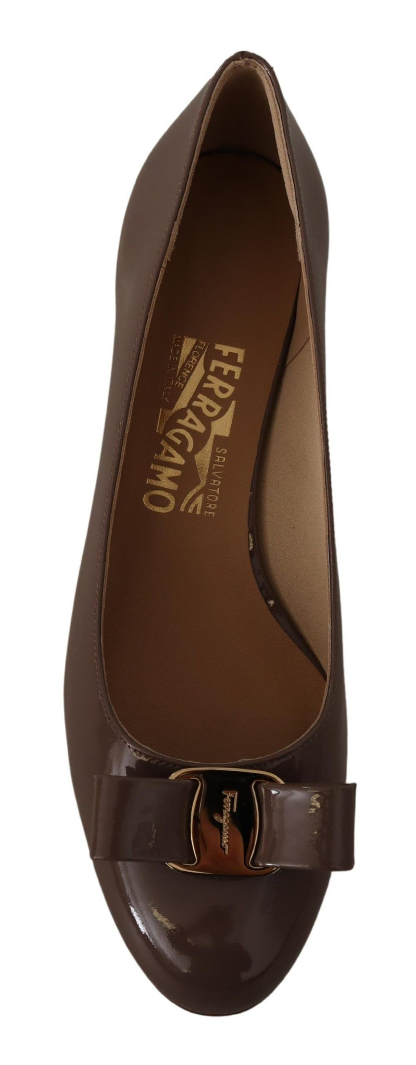 Elegant Caraway Brown Pumps with Vara BowDiscover the epitome of sophistication with these beautiful Caraway Brown pumps from the iconic Salvatore Ferragamo. Perfect for adding a touch of elegance to any formal outfit or elevating your day-to-day style, t