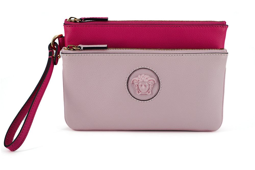 Elegant Pink Leather Pouch ClutchDrape yourself in luxury with this stunning new arrival from Versace. A perfect blend of fashion and functionality, this pouch clutch bag is crafted from the finest calf leather, boasting a rich pink hue that makes a bold