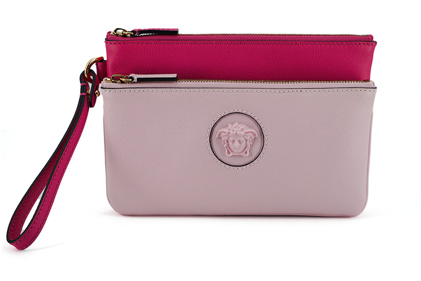 Elegant Pink Leather Pouch ClutchDrape yourself in luxury with this stunning new arrival from Versace. A perfect blend of fashion and functionality, this pouch clutch bag is crafted from the finest calf leather, boasting a rich pink hue that makes a bold