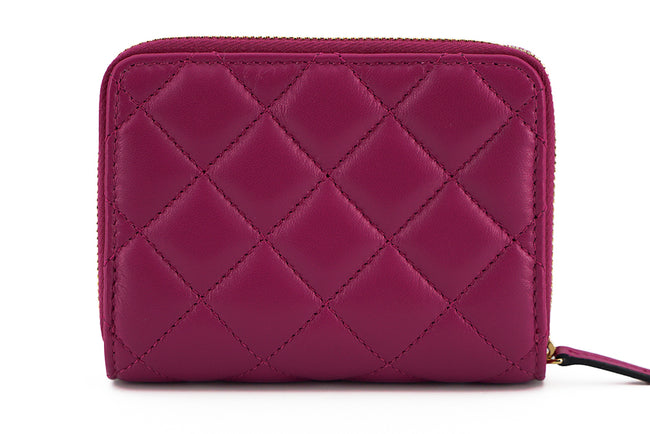 Elegant Purple Quilted Leather WalletDiscover sophistication with our striking Versace Bifold Zip Wallet, a testament to timeless elegance and functionality. This luxurious accessory, complete with original tags, box, and dustbag, is sure to enchant with