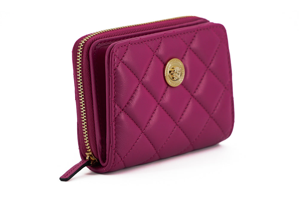 Elegant Purple Quilted Leather WalletDiscover sophistication with our striking Versace Bifold Zip Wallet, a testament to timeless elegance and functionality. This luxurious accessory, complete with original tags, box, and dustbag, is sure to enchant with