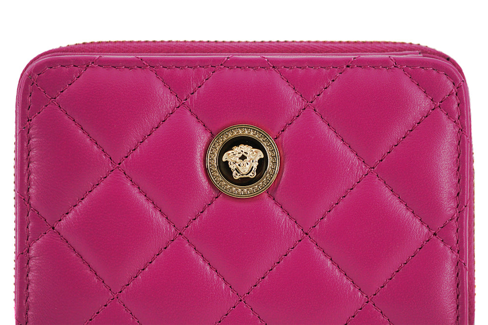 Elegant Purple Quilted Leather WalletDiscover sophistication with our striking Versace Bifold Zip Wallet, a testament to timeless elegance and functionality. This luxurious accessory, complete with original tags, box, and dustbag, is sure to enchant with