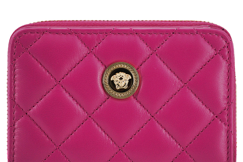 Elegant Purple Quilted Leather WalletDiscover sophistication with our striking Versace Bifold Zip Wallet, a testament to timeless elegance and functionality. This luxurious accessory, complete with original tags, box, and dustbag, is sure to enchant with
