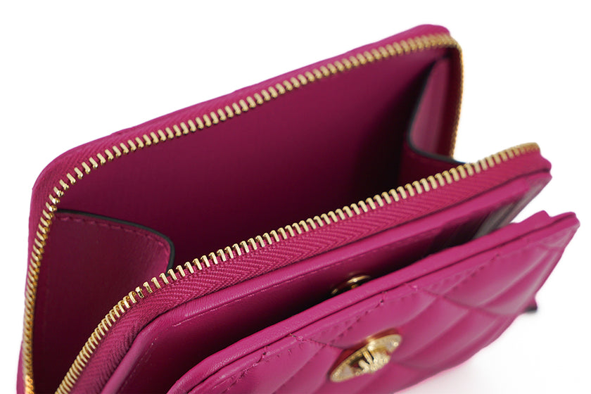 Elegant Purple Quilted Leather WalletDiscover sophistication with our striking Versace Bifold Zip Wallet, a testament to timeless elegance and functionality. This luxurious accessory, complete with original tags, box, and dustbag, is sure to enchant with