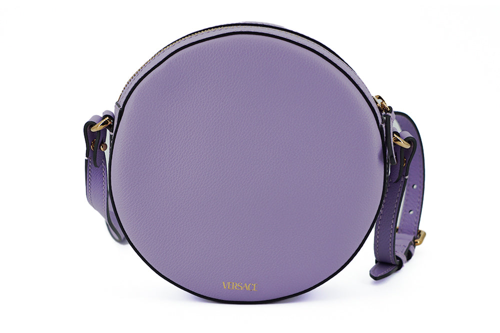 Elegant Purple Round Shoulder BagImmerse yourself in the epitome of elegance with this stunning Versace Disco Round Shoulder Bag. Brand new with tags, and accompanied by the original Versace dust bag, this accessory is crafted from the finest calf leather