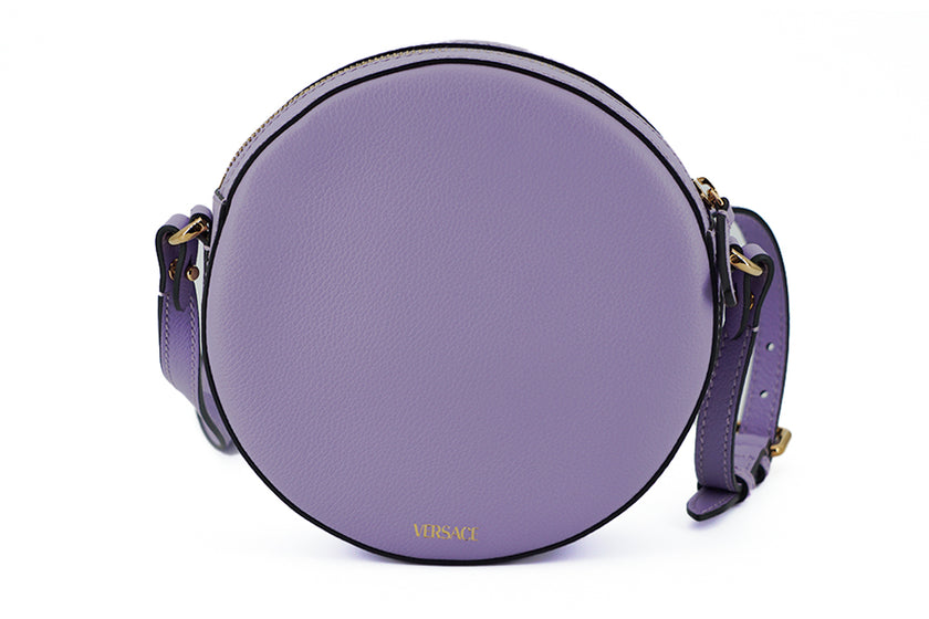 Elegant Purple Round Shoulder BagImmerse yourself in the epitome of elegance with this stunning Versace Disco Round Shoulder Bag. Brand new with tags, and accompanied by the original Versace dust bag, this accessory is crafted from the finest calf leather