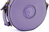 Elegant Purple Round Shoulder BagImmerse yourself in the epitome of elegance with this stunning Versace Disco Round Shoulder Bag. Brand new with tags, and accompanied by the original Versace dust bag, this accessory is crafted from the finest calf leather