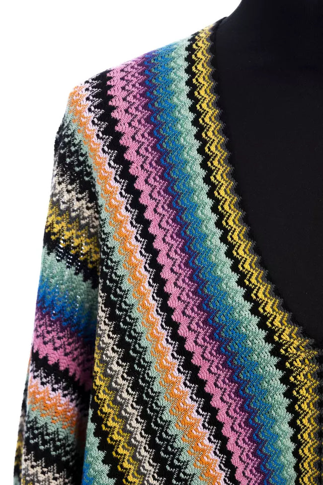 Multicolor Wool Women PonchoInfuse your look with the playful elegance of Missoni’s Fringed Poncho, where Italian artistry meets bohemian chic. This statement piece boasts a mesmerizing geometric fantasy in a kaleidoscope of colors, harmonized with whimsi