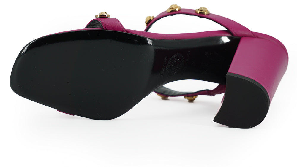 Elegant Purple Calf Leather High SandalsStep into luxury with these stunning Versace high sandals, a perfect blend of style and elegance. Fashioned from sumptuous calf leather in a rich purple hue, these open-toe heels feature the iconic Medusa logo and g