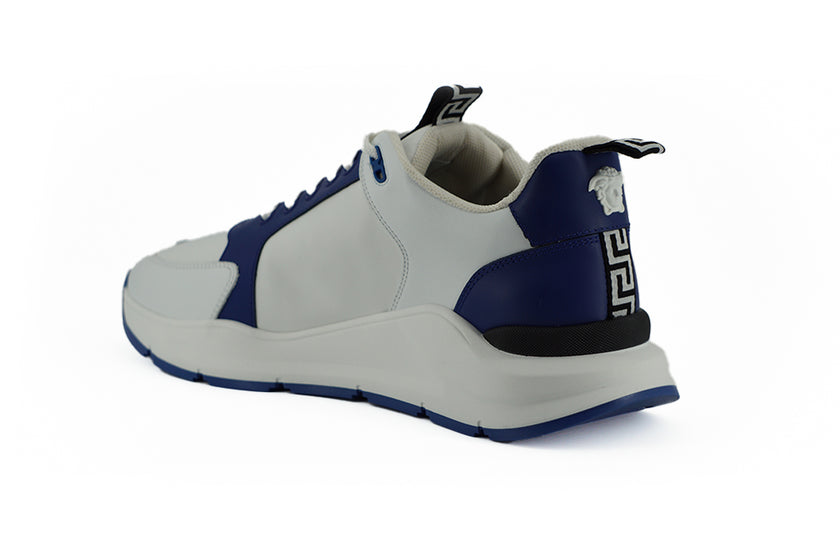 Elegant Blue and White Leather SneakersStep into luxury with these stunning Versace sneakers, a perfect blend of style and comfort. These are brand new with tags, accompanied by the original dust bag and shoe box. Crafted from smooth calf leather, these s