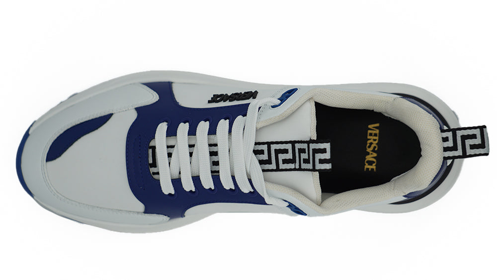 Elegant Blue and White Leather SneakersStep into luxury with these stunning Versace sneakers, a perfect blend of style and comfort. These are brand new with tags, accompanied by the original dust bag and shoe box. Crafted from smooth calf leather, these s