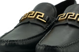 Elegant Black Calf Leather Men's LoafersStep into luxury with these 100% Authentic Versace men’s loafers, perfect for the discerning gentleman. These exquisite shoes come brand new with original box, tags, and dust bag, ensuring their pristine condition.