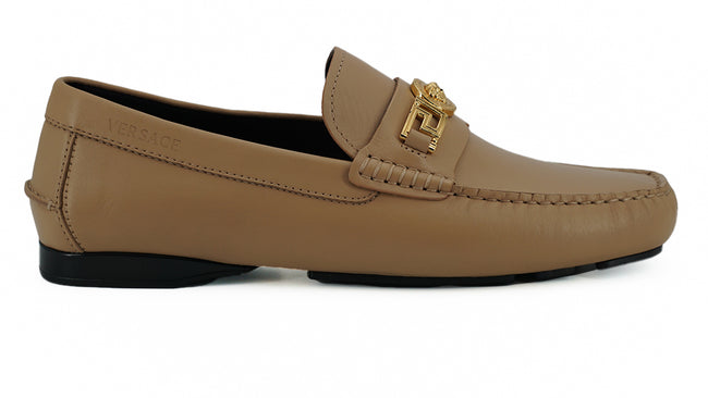 Exquisite Medusa Gold-Tone Leather LoafersIndulge in the epitome of luxury with these 100% authentic Versace men’s loafers, new with tags, box, and dust bag included. Crafted from the finest calf leather in an elegant beige hue, these shoes are the perfec
