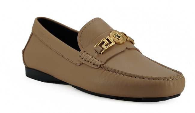 Exquisite Medusa Gold-Tone Leather LoafersIndulge in the epitome of luxury with these 100% authentic Versace men’s loafers, new with tags, box, and dust bag included. Crafted from the finest calf leather in an elegant beige hue, these shoes are the perfec