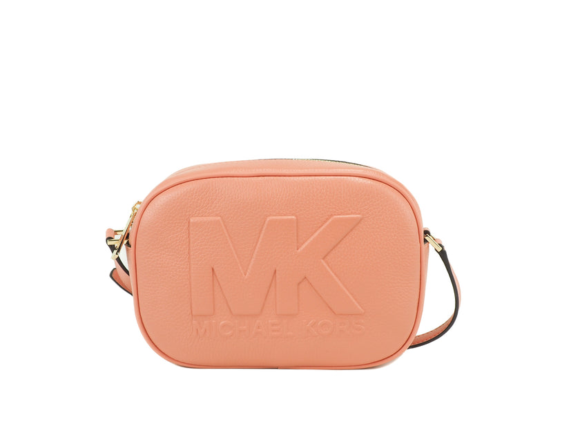 Jet Set Travel Medium Sherbert Leather Oval Camera Crossbody BagStyle: Michael Kors Jet Set Travel Medium Oval Camera Crossbody Bag (Sherbert) Material: Pebbled Leather Features: 2 Inner Slip Pockets, Lined, Adjustable Crossbody Strap Measures: 22.86 cm W