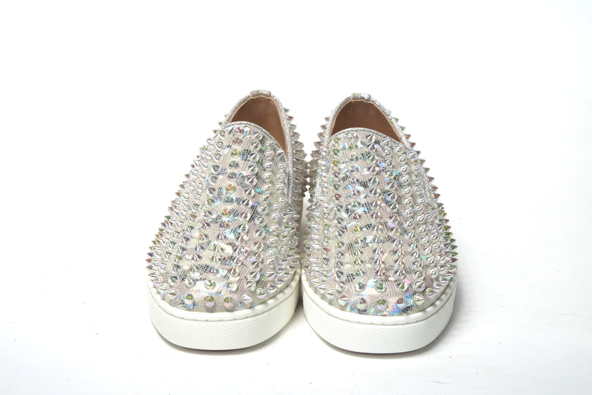 White Ab/Clear Ab Roller Boat Woman Flat SneakerChristian Louboutin Color : White Ab/Clear Ab Product Style : Slip on Sneaker Material: Embellished Leather Sneaker With Spike Clear Crystals Roller Boat Woman Flat Calf Lame Leosyaar/Nappa/Mic Slip on Sneak