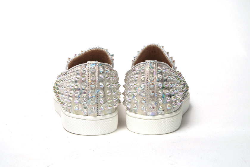White Ab/Clear Ab Roller Boat Woman Flat SneakerChristian Louboutin Color : White Ab/Clear Ab Product Style : Slip on Sneaker Material: Embellished Leather Sneaker With Spike Clear Crystals Roller Boat Woman Flat Calf Lame Leosyaar/Nappa/Mic Slip on Sneak