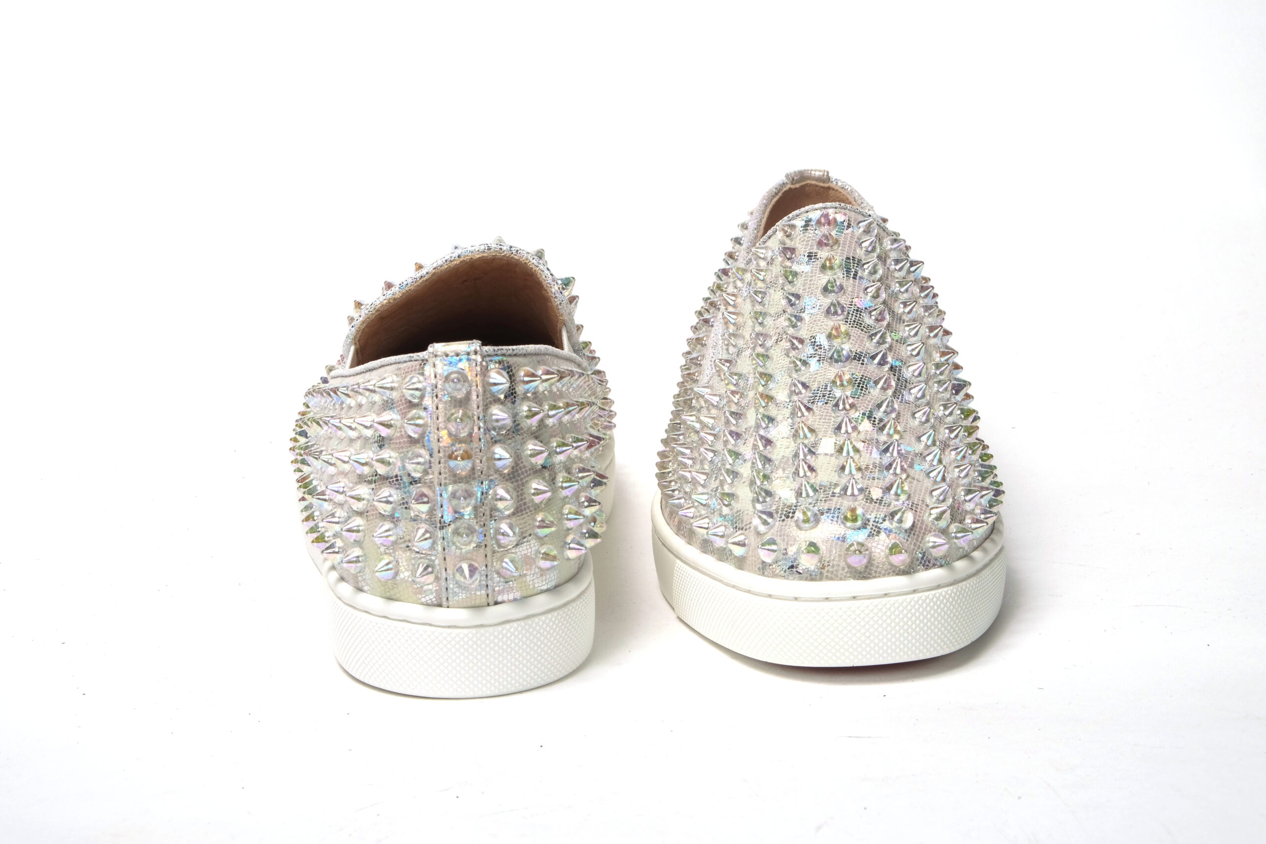 White Ab/Clear Ab Roller Boat Woman Flat SneakerChristian Louboutin Color : White Ab/Clear Ab Product Style : Slip on Sneaker Material: Embellished Leather Sneaker With Spike Clear Crystals Roller Boat Woman Flat Calf Lame Leosyaar/Nappa/Mic Slip on Sneak