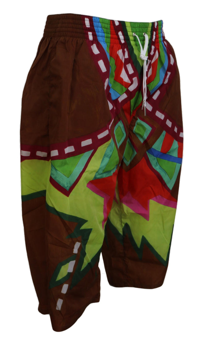 Multicolor Printed Men Beachwear Shorts SwimwearDSQUARED2 Absolutely stunning, 100% Authentic, exclusive brand new with tags DSQUARED2 Beachwear swimming shorts. Model: Swim shorts Boxer Color: Multicolor with print Material: 100% Polyamide Elastic waist