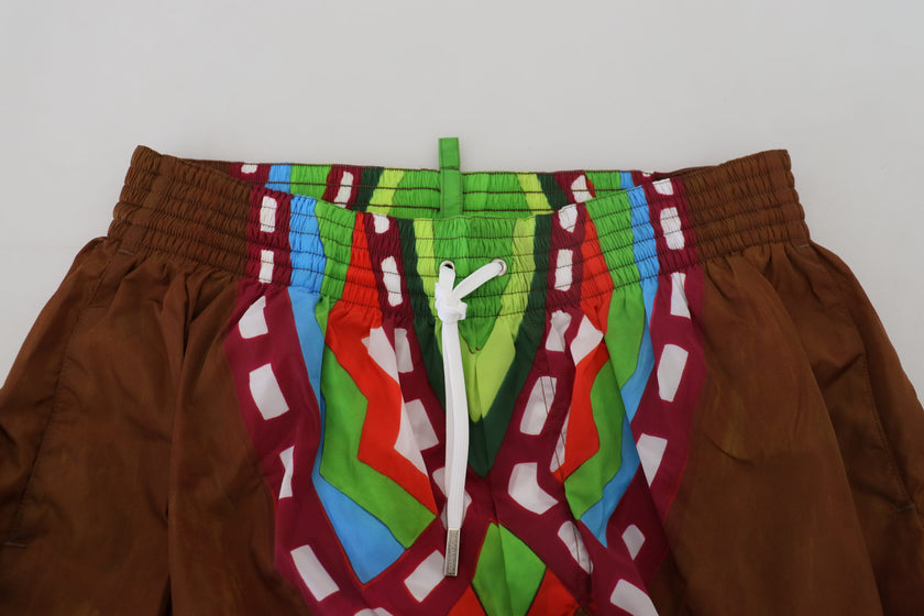 Multicolor Printed Men Beachwear Shorts SwimwearDSQUARED2 Absolutely stunning, 100% Authentic, exclusive brand new with tags DSQUARED2 Beachwear swimming shorts. Model: Swim shorts Boxer Color: Multicolor with print Material: 100% Polyamide Elastic waist
