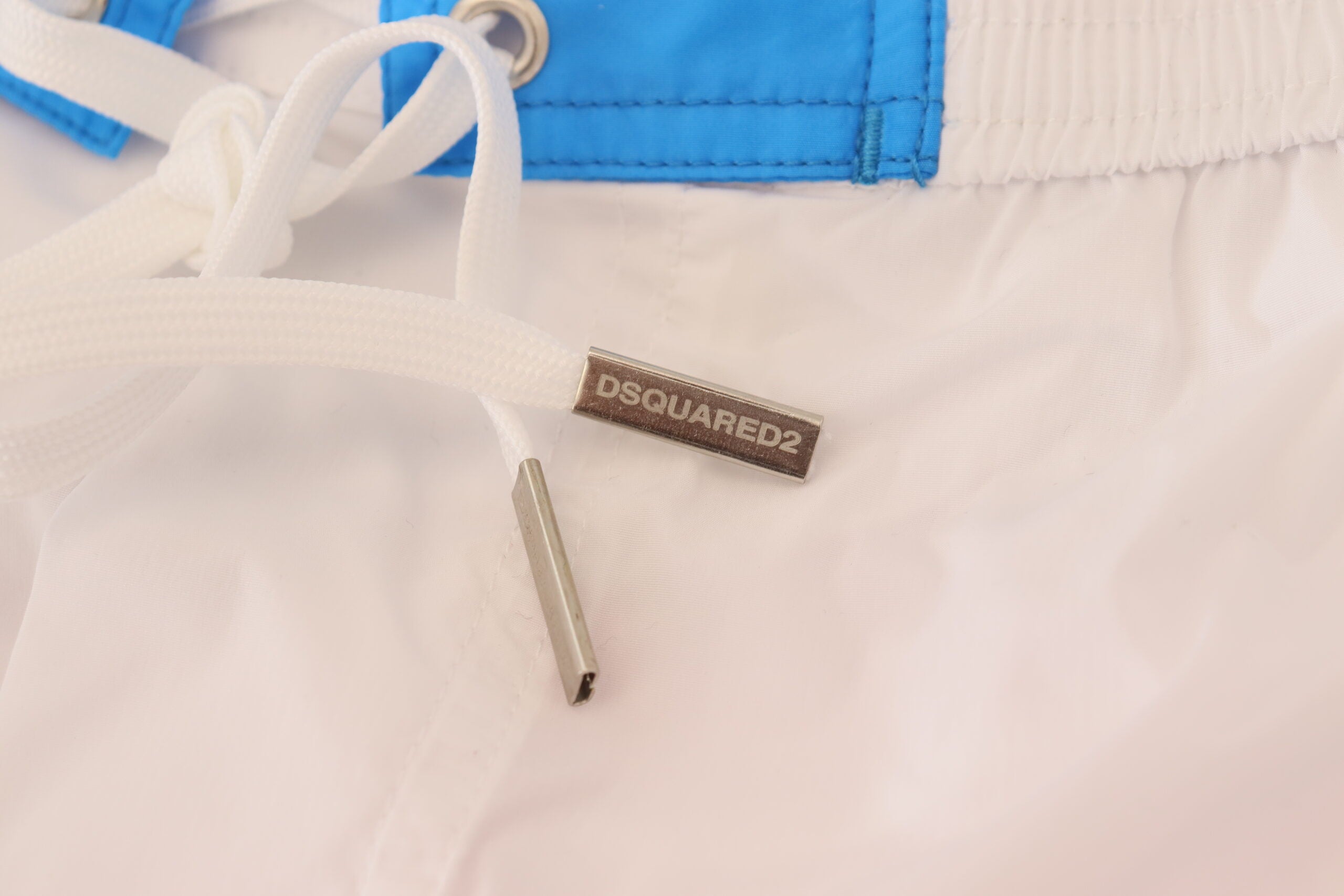 Short de bain homme imprimé logo blanc et rose