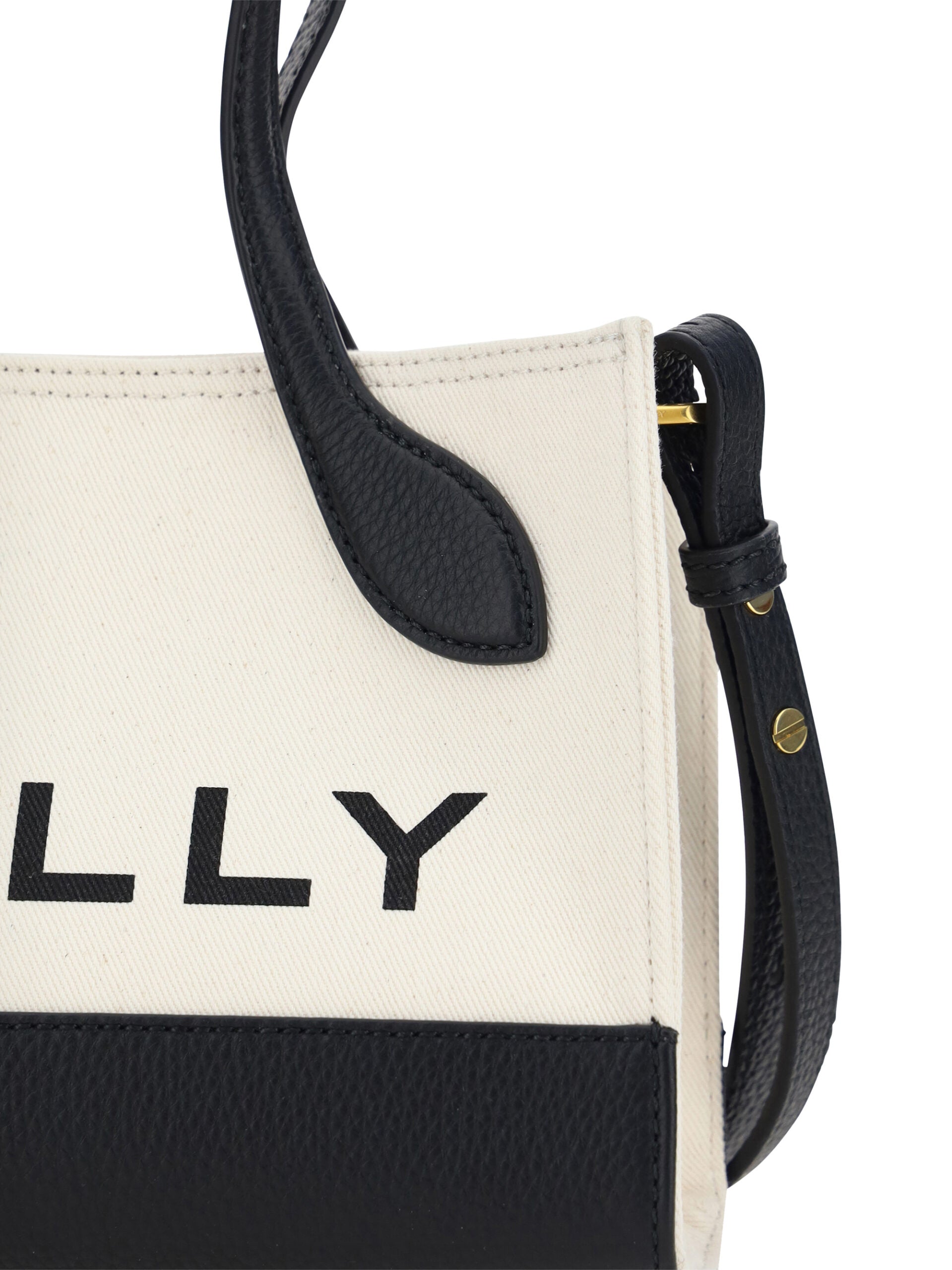 Chic Contrast Mini Leather HandbagIndulge in the epitome of elegance with the Bally Mini Handbag, a stunning accessory that promises to uplift your style quotient. Crafted with immaculate precision, this stunning piece boasts a sleek black and white palet