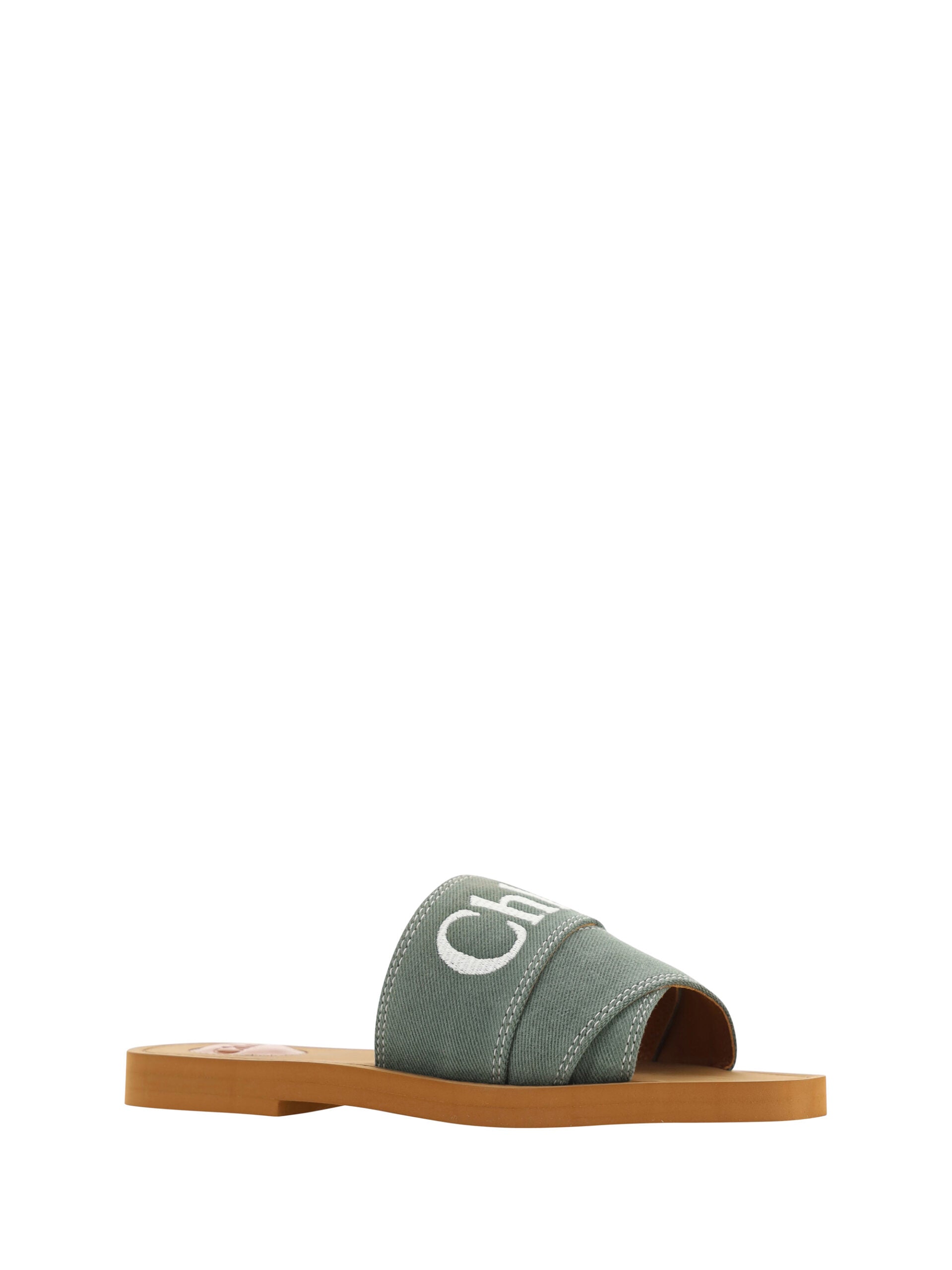 Elegant Forest Green Cotton SlidesStep into comfort and luxury with these exquisite Chloé slides, perfect for the discerning fashionista. Boasting a fresh Forest Green hue, these sandals marry style and comfort seamlessly. Designed with a chic open square