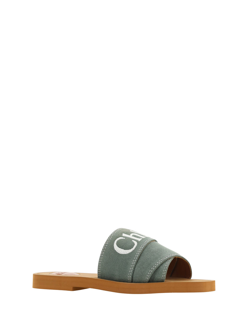 Elegant Forest Green Cotton SlidesStep into comfort and luxury with these exquisite Chloé slides, perfect for the discerning fashionista. Boasting a fresh Forest Green hue, these sandals marry style and comfort seamlessly. Designed with a chic open square