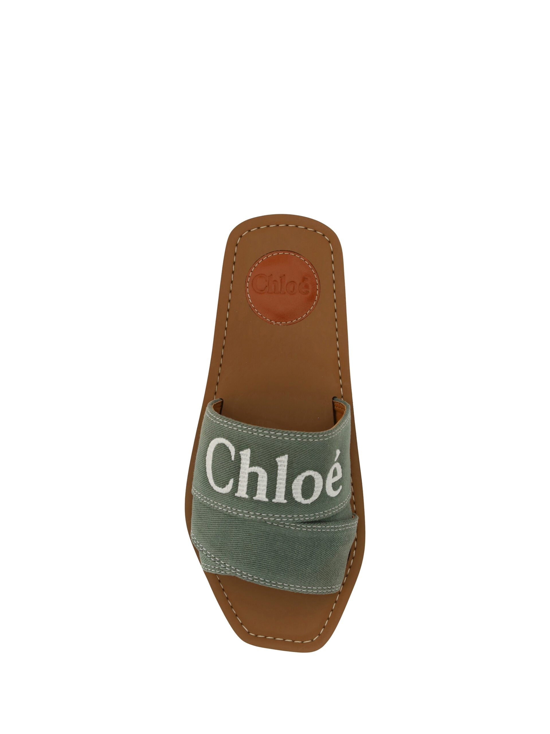 Elegant Forest Green Cotton SlidesStep into comfort and luxury with these exquisite Chloé slides, perfect for the discerning fashionista. Boasting a fresh Forest Green hue, these sandals marry style and comfort seamlessly. Designed with a chic open square