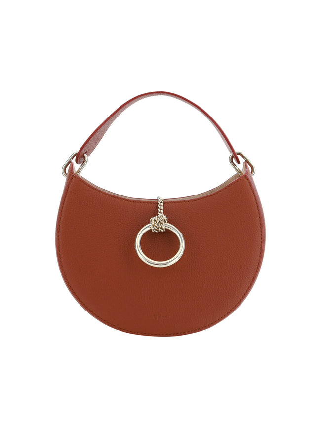 Sepia Brown Small Arlène Leather Shoulder BagDiscover the epitome of elegance with the Chloé Small Arlène Shoulder Bag. This stunning accessory in sepia brown is a sleek addition to any wardrobe, blending timeless style with modern sensibilities. Complete